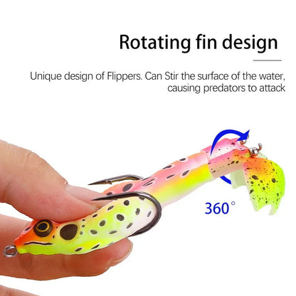 Topwater frog lure for bass fishing with rotating fin design held in hand stirring water surface